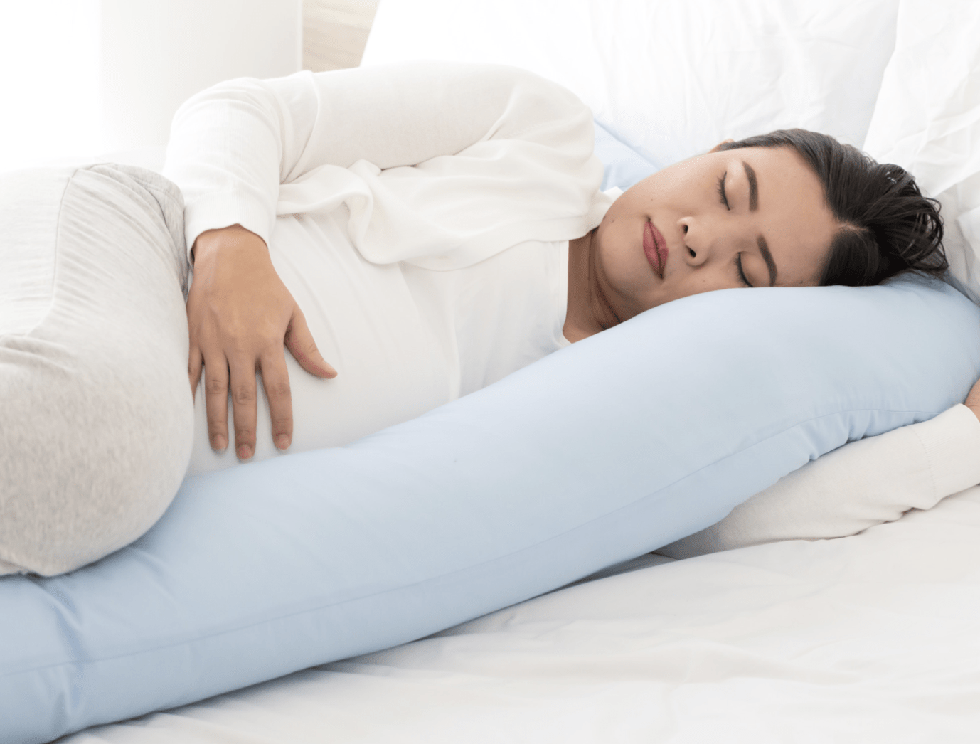 In female patients, a large pillow is placed between the two legs at